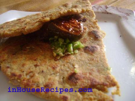 Once your paratha attains rich golden brown color from both the sides, it is ready to serve hot. Top it up with butter and enjoy with coriander chutney/sauce or Pickle.